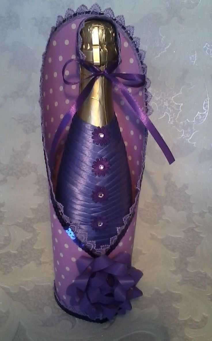 beautiful design of champagne bottles with decorative ribbons
