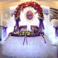 bright decoration of the wedding hall with ribbons picture