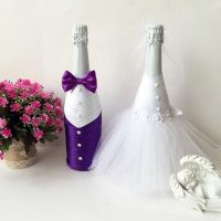 chic decoration of glass bottles with decorative ribbons picture