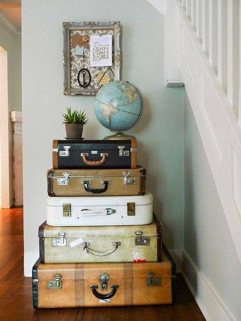 beautiful bedroom interior with old suitcases
