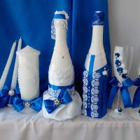 unusual decoration of glass bottles with decorative ribbons picture