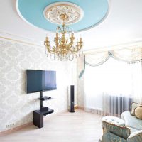 combination of bright wallpapers in the interior of the living room photo