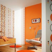 a combination of bright orange in the style of the kitchen with other colors picture