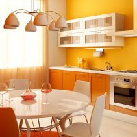 a combination of bright orange in the interior of the room with other colors