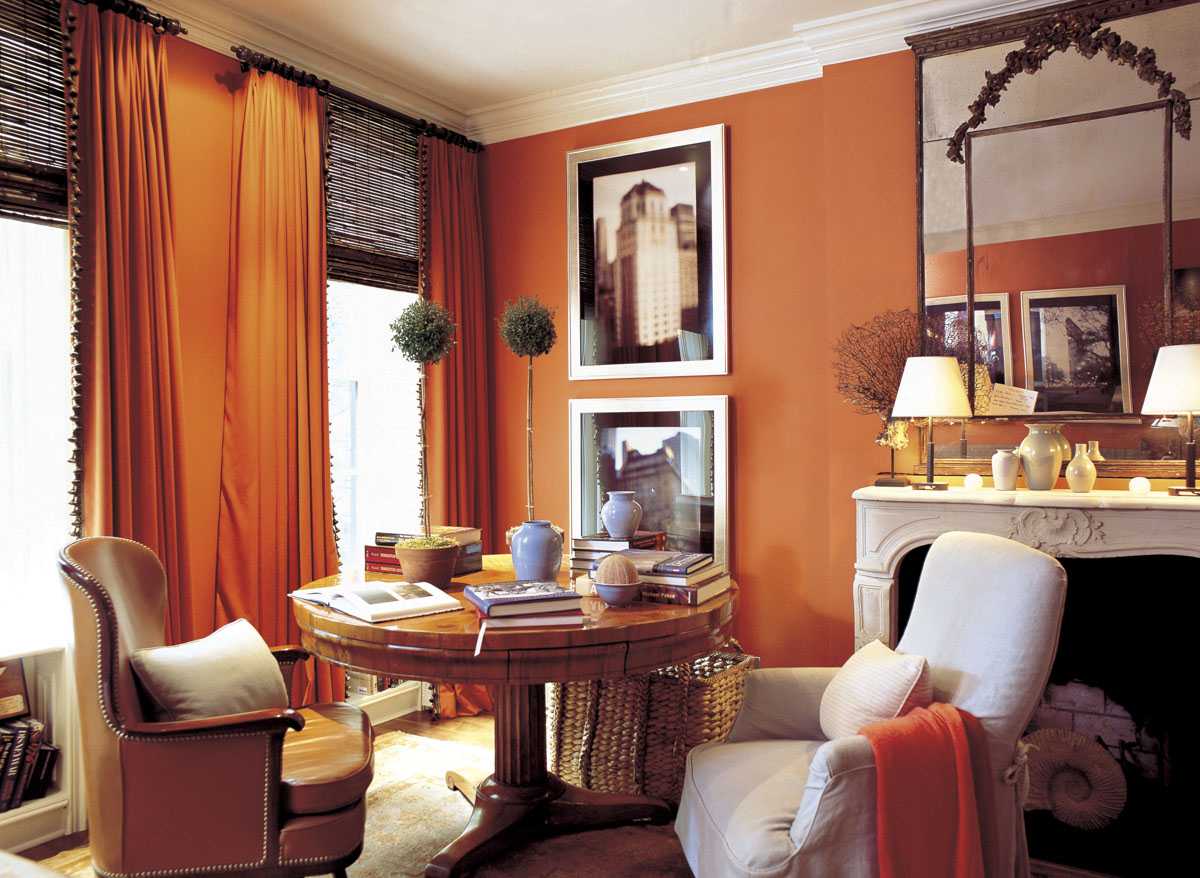 a combination of dark orange in the interior of the room with other colors