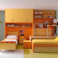 a combination of bright orange in the design of the kitchen with other colors of the photo
