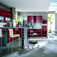 a combination of dark gray in the design of the kitchen with other colors of the photo