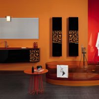 a combination of dark orange in the decor of the apartment with other colors photo