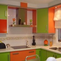 combination of bright orange in the design of the kitchen with other colors picture