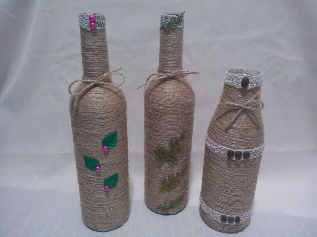 the idea of ​​an unusual design of champagne bottles with twine