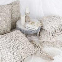 crocheted pillows in the interior of the apartment photo