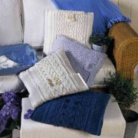 knitted pillowcases in the decor of the room photo