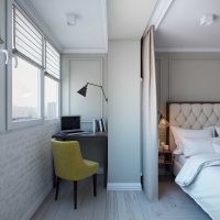 camera da letto in stile chiaro e soggiorno in una foto della stanza