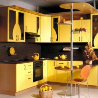 unusual interior of the kitchen in mustard color photo
