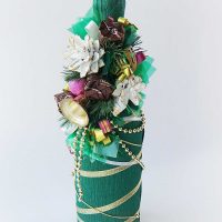 beautiful decoration of champagne bottles with colorful ribbons picture