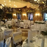 unusual decoration of the wedding hall with flowers picture