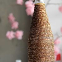variant of beautiful decoration of glass bottles with beads picture