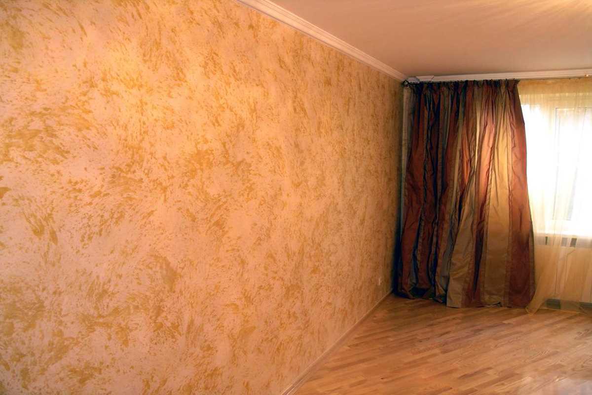 the idea of ​​a bright room design with decorative stucco