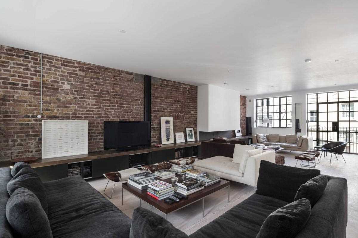 the idea of ​​using an unusual decorative brick in the design of the living room
