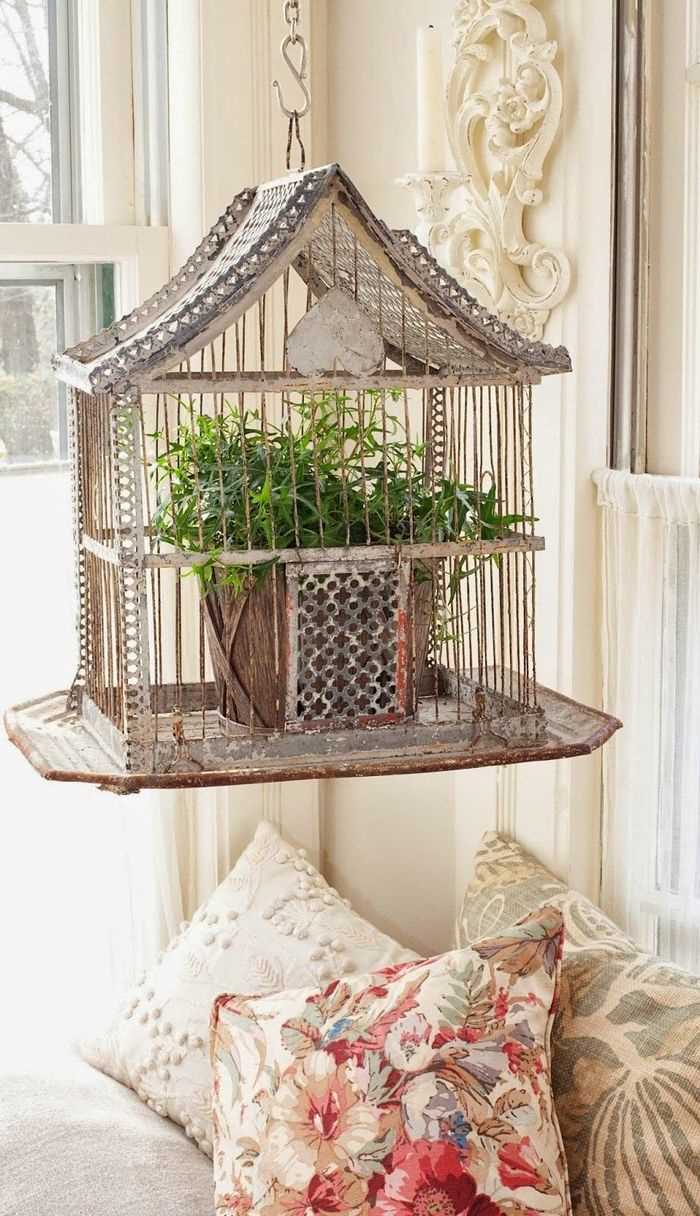 the idea of ​​the original interior of the room with a decorative cage