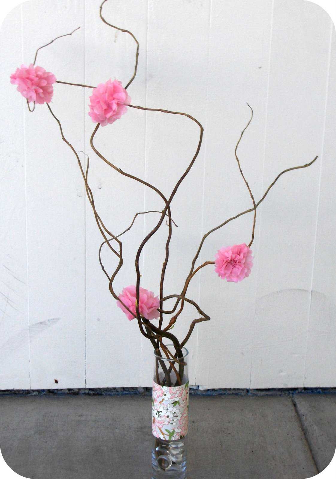 the idea of ​​the original design of a floor vase with decorative branches