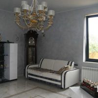 the idea of ​​beautiful decorative plaster in the interior of the living room under concrete photo