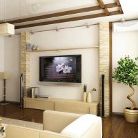 the idea of ​​a beautiful living room design with decorative beams photo