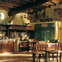 the idea of ​​the original interior of the kitchen with decorative beams picture
