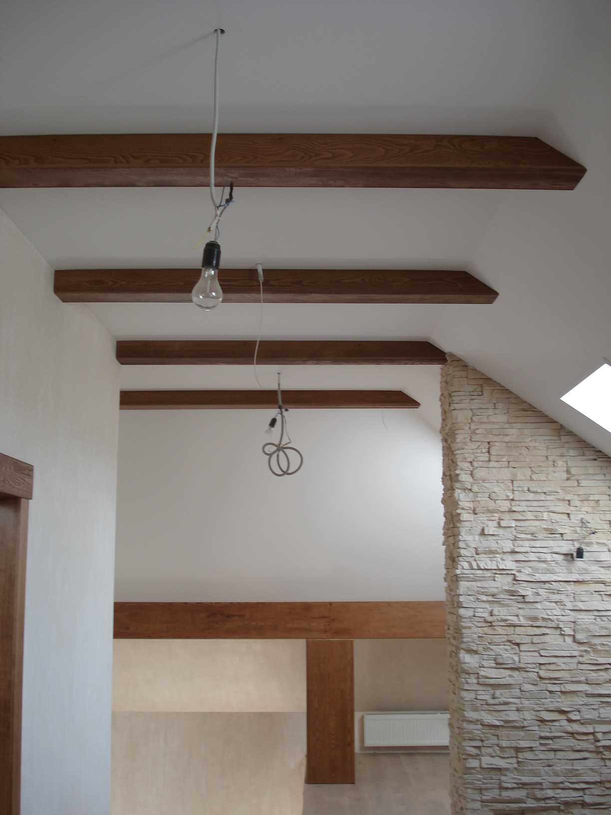 variant of a beautiful apartment decor with decorative beams