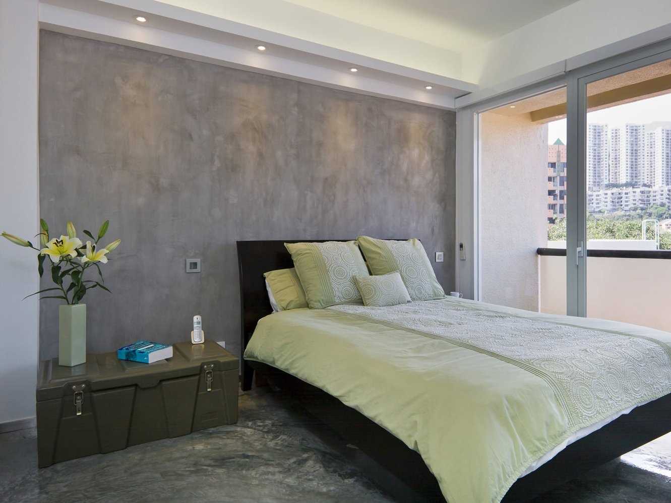 the idea of ​​a beautiful decorative plaster in the design of an apartment for concrete