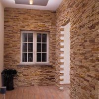 option of using the original decorative brick in the interior of the apartment photo