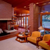 option of using the original decorative brick in the interior of the living room photo