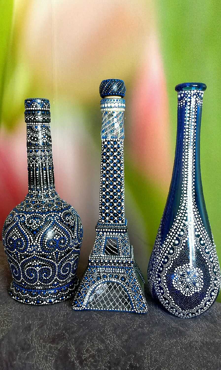 a variant of beautiful decoration of glass bottles with beads