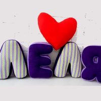 the option of using decorative letters in the design of the bedroom photo