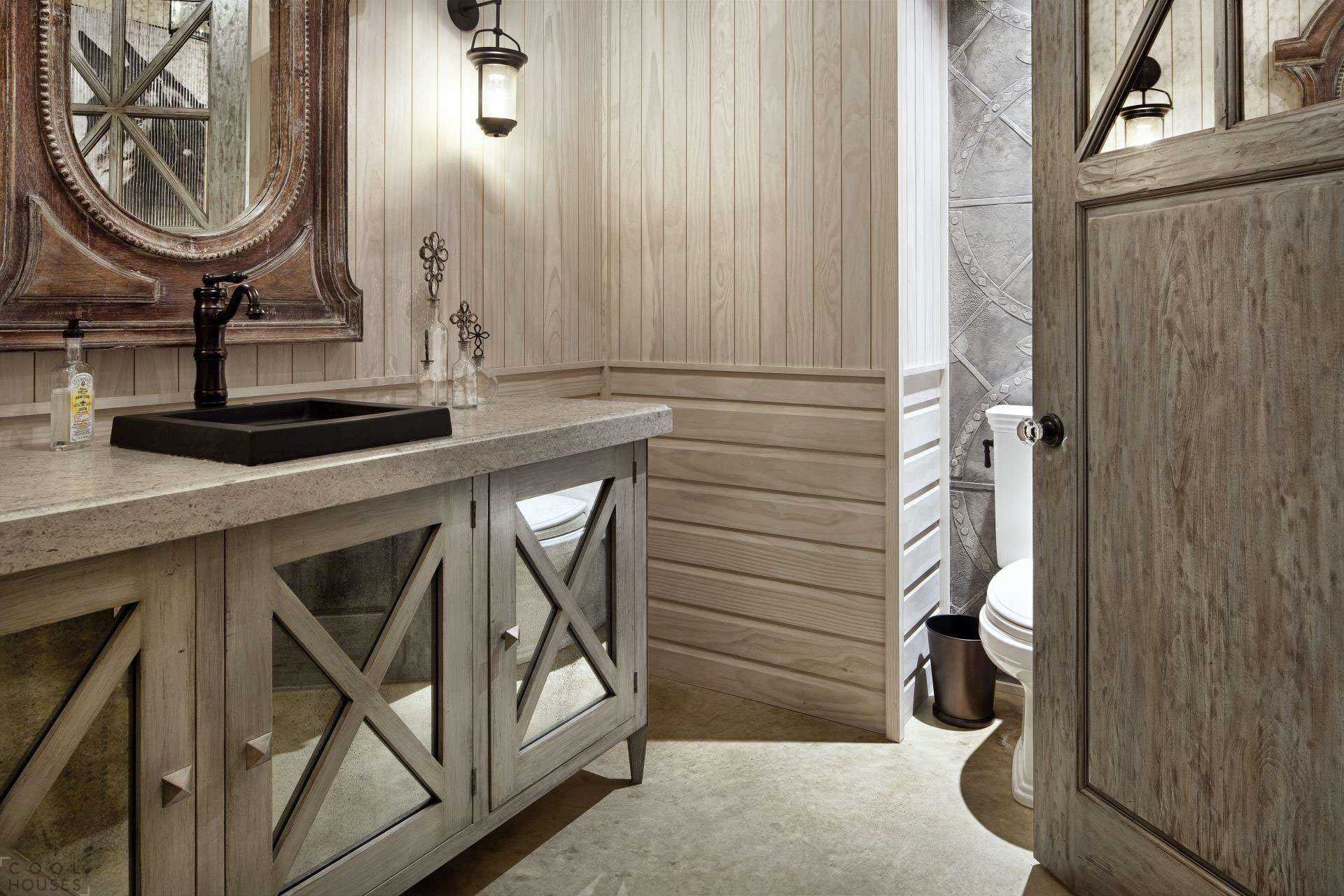 version of the modern bathroom interior in a wooden house