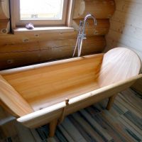idea of ​​unusual style of a bathroom in a wooden house photo