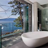 idea of ​​a bright interior of a bathroom with a picture window