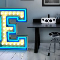 option of using decorative letters in the style of a bedroom photo
