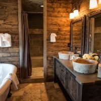version of a beautiful design of a bathroom in a wooden house photo