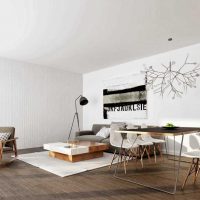 An example of a bright living room design in the style of minimalism photo