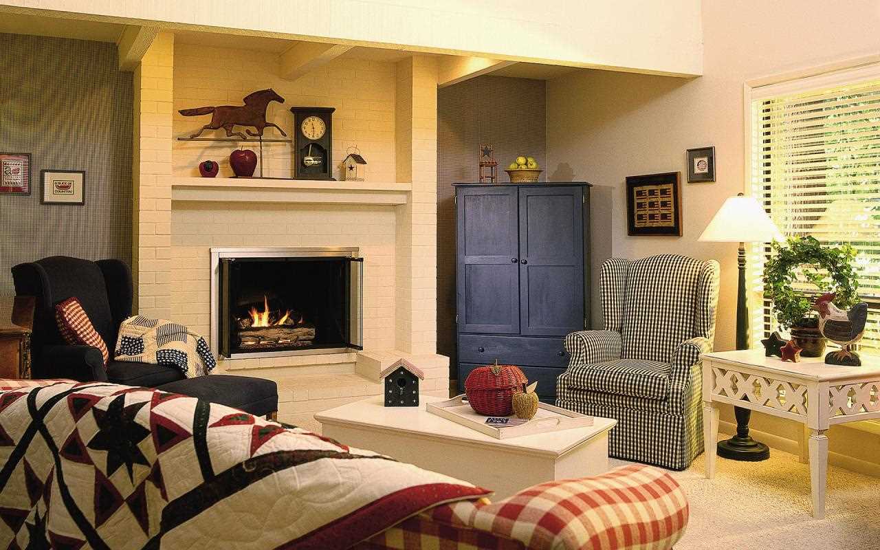 An example of a bright living room design with a fireplace