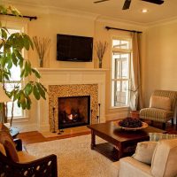 An example of a light living room design with a fireplace picture