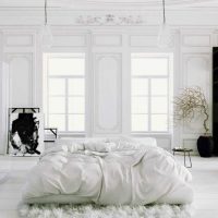 version of the bright bedroom interior in white color photo