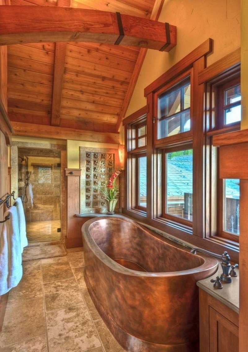 version of the modern design of the bathroom in a wooden house