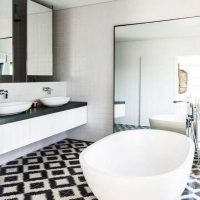 version of the bright interior of the bathroom in black and white tones photo