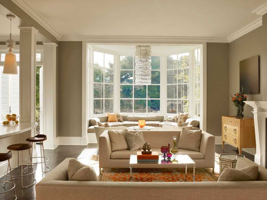 An example of a light living room decor with a bay window