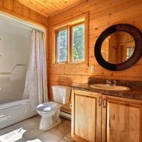 version of the unusual design of the bathroom in a wooden house picture