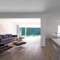 the idea of ​​using a light laminate in an unusual apartment design photo