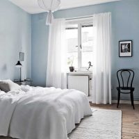 the option of using an unusual blue color in the design of a house photo