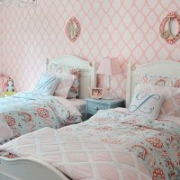 example of a bright style of a children's room for two girls photo
